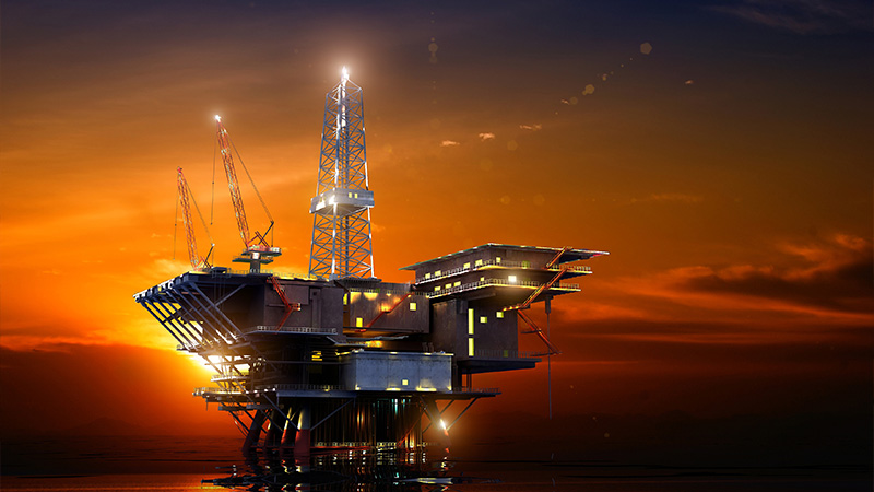 Offshore oil and gas platform at dusk