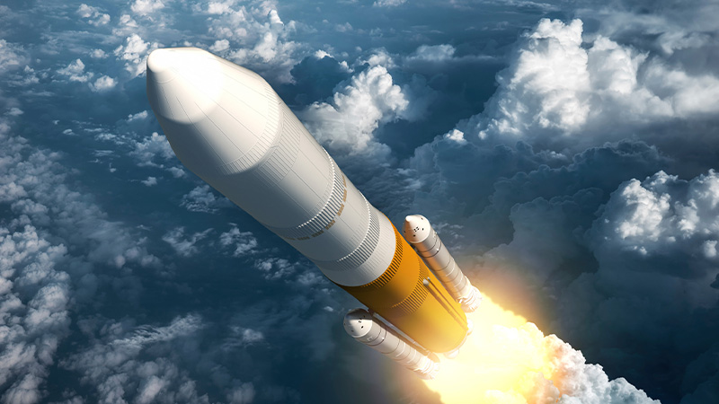 Rocket launching through clouds